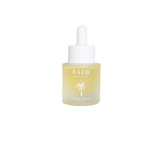 A small bottle of bare glow by Bare Essential Organics features a white dropper cap. The translucent bottle with yellow oil displays a palm tree logo and text on the front. Infused with antioxidants for radiant skin, it stands out against the plain black background.