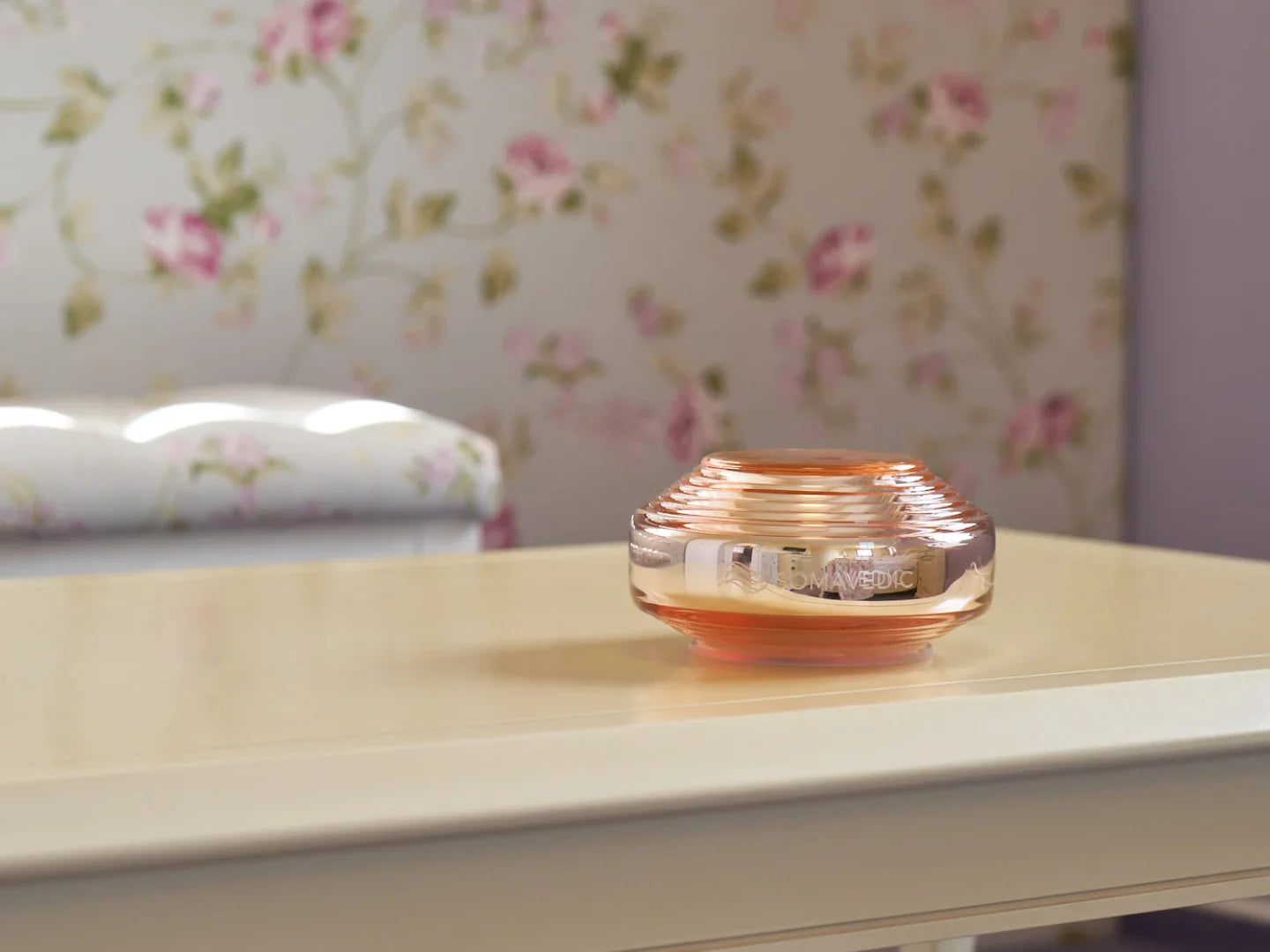 The Somavedic USA Rosalin, a small round glass jar with a peach-colored lid, rests on a beige table. Floral wallpaper and an upholstered bench evoke serene spaces, ideal for supporting your circadian rhythm.