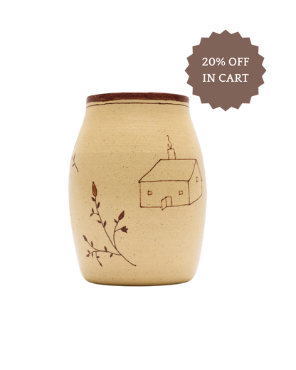 The Baile Homestead Vase by Baile is a handmade beige ceramic vase with a brown house and branch design plus a brown rim—perfect for natural decor. Save 20% in cart.