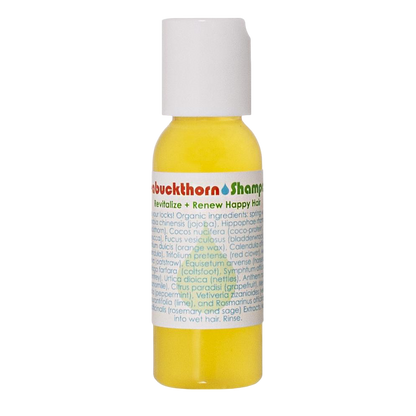A small, yellow bottle of Living Libations' Seabuckthorn Shampoo, labeled "Seabuckthorn Shampoo," highlights text on its organic ingredients and benefits. The white flip-top cap securely seals in 1-2 ounces of botanical delights enriched with coco-protein, ensuring a nourishing wash every time.