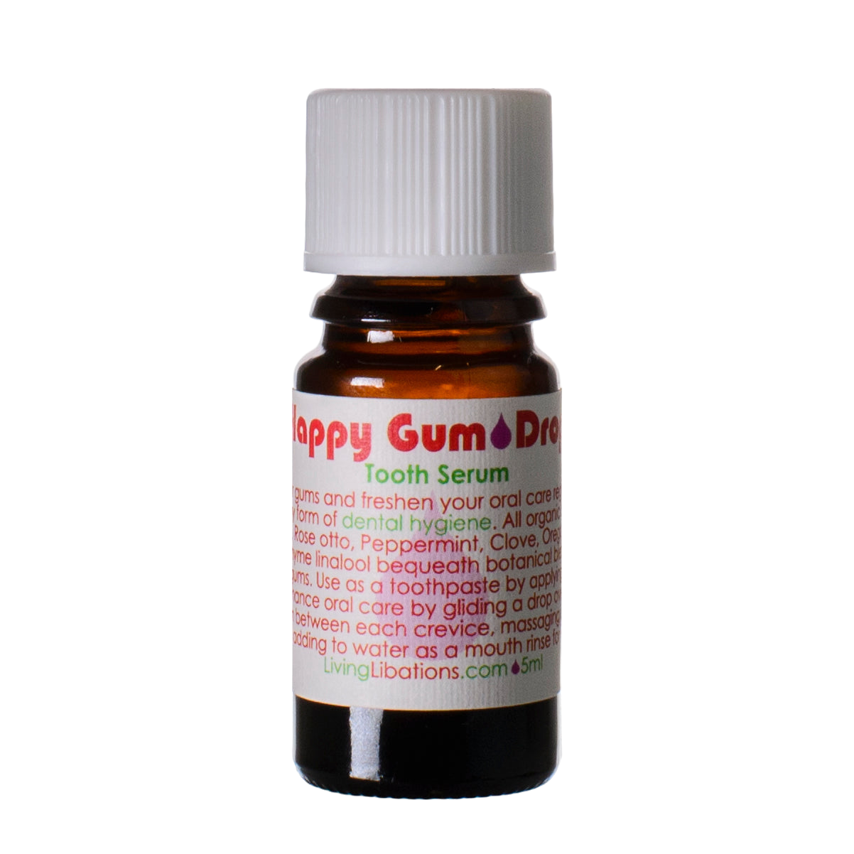 A small brown glass bottle labeled "Happy Gum Drops" from Living Libations promotes dental hygiene. The bottle features a white cap and a white label with green and red text detailing usage instructions. Using natural ingredients such as peppermint and clove oil, this 5ml product ensures your teeth stay fresh and healthy.