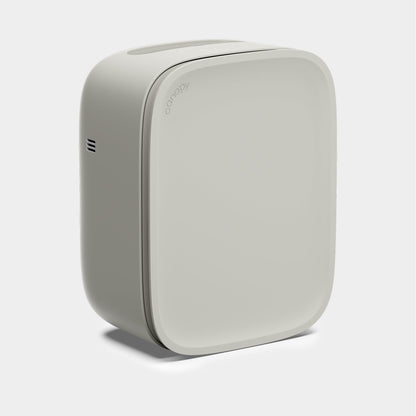 Moonstruck The Canopy Bedside Air Purifier is a sleek, modern light gray rectangular device with rounded edges, minimal design, a side vent, and "Canopy" branding on the front corner; fulfilled by Canopy for reliable delivery.