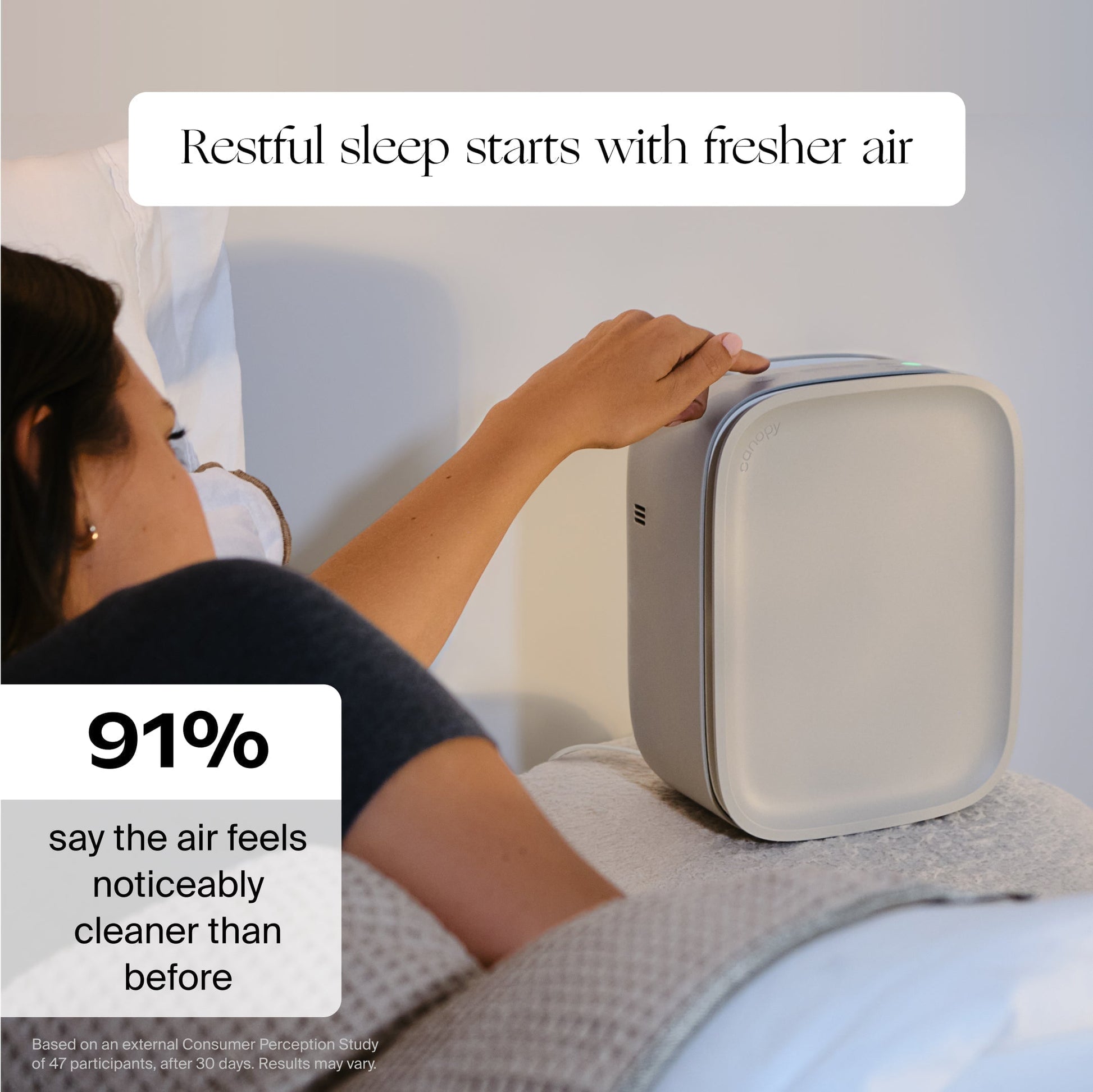White Cream Jade Moonstruck Clara Peirce Polly A person in bed turns on a Canopy Bedside Air Purifier. Text: "Restful sleep starts with fresher air" and "91% say the air feels noticeably cleaner than before." Product fulfilled by Canopy.