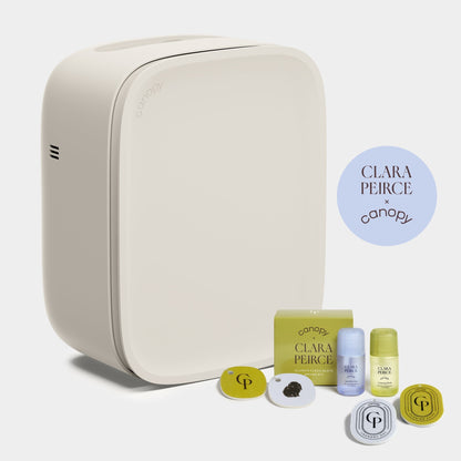 Clara Peirce Polly A sleek, Canopy Bedside Air Purifier is shown with skincare items and fragrance discs next to a round "CLARA PEIRCE x canopy" logo, fulfilled by Canopy.