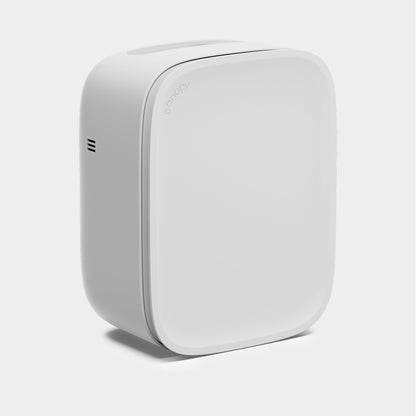 White A sleek, modern white Bedside Air Purifier by Canopy with rounded edges and minimal design features the "canopy" logo on the front and a side vent. Displayed on a light gray background. All orders are fulfilled by Canopy.