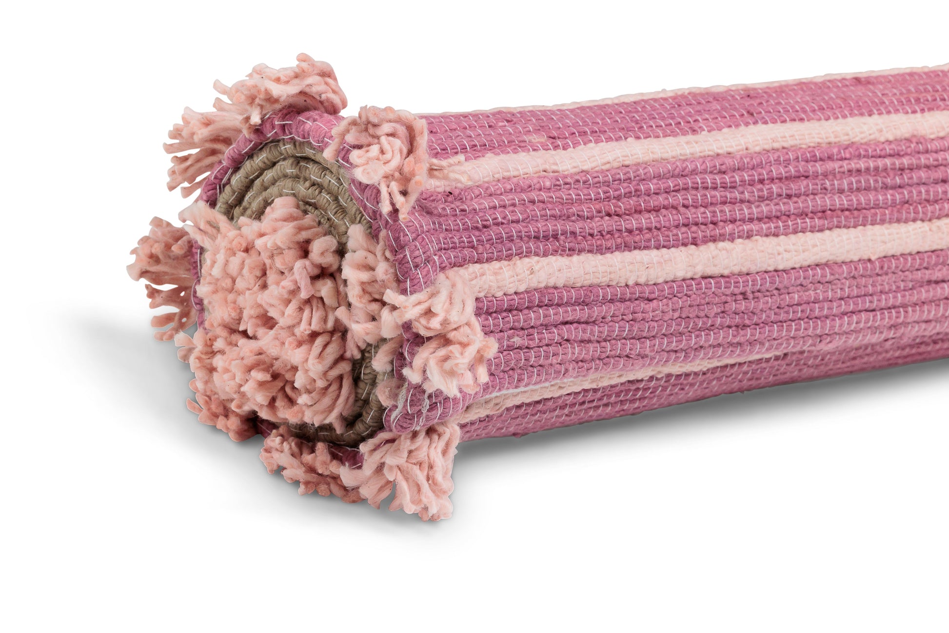 A rolled-up pink and striped yoga mat, crafted from ethically sourced cotton, featuring textured tassels at the end, against a white background by Bennd Yoga. It is named the Dark Harda and Sappan Wood Ayurvedic Yoga Mat.