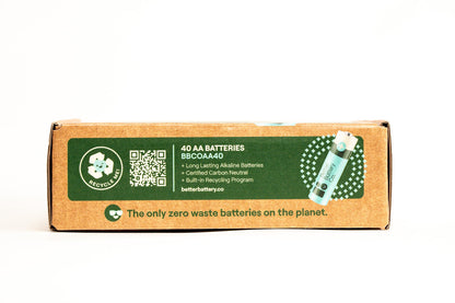 The AA 40 Pack from Better Battery Co. comes in a rectangular cardboard box adorned with a green label featuring recycling symbols, a QR code, and product details, all while showcasing its carbon-neutral status and recyclable packaging.