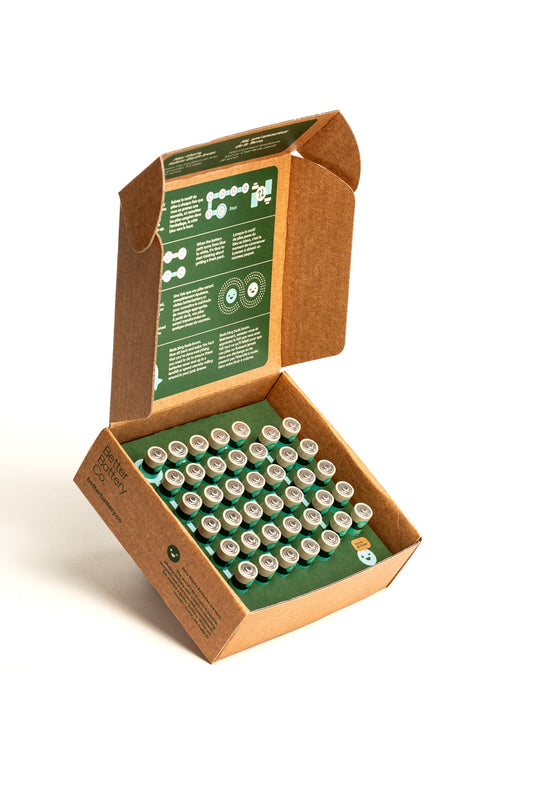 A recyclable open cardboard box from Better Battery Co., featuring their AA 40 Pack of alkaline batteries neatly arranged in rows. The inner lid provides instructions or information, with the box and batteries displayed against a plain white background.