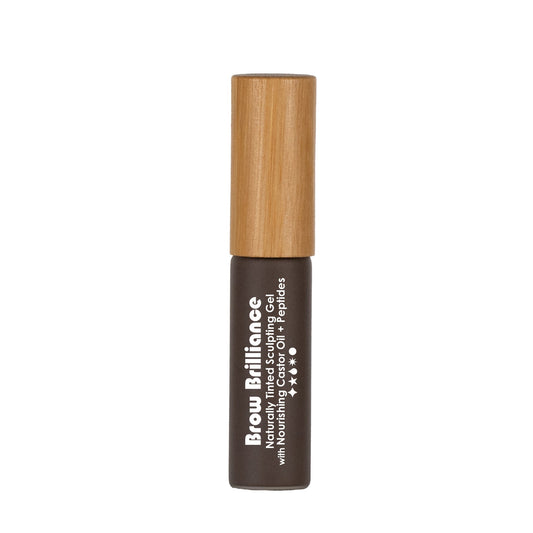 Living Libations Brow Brilliance - Naturally Tinted Sculpting Gel features a brown base, white text, and a light wooden cap, designed to nourish, sculpt, and enhance natural brows.