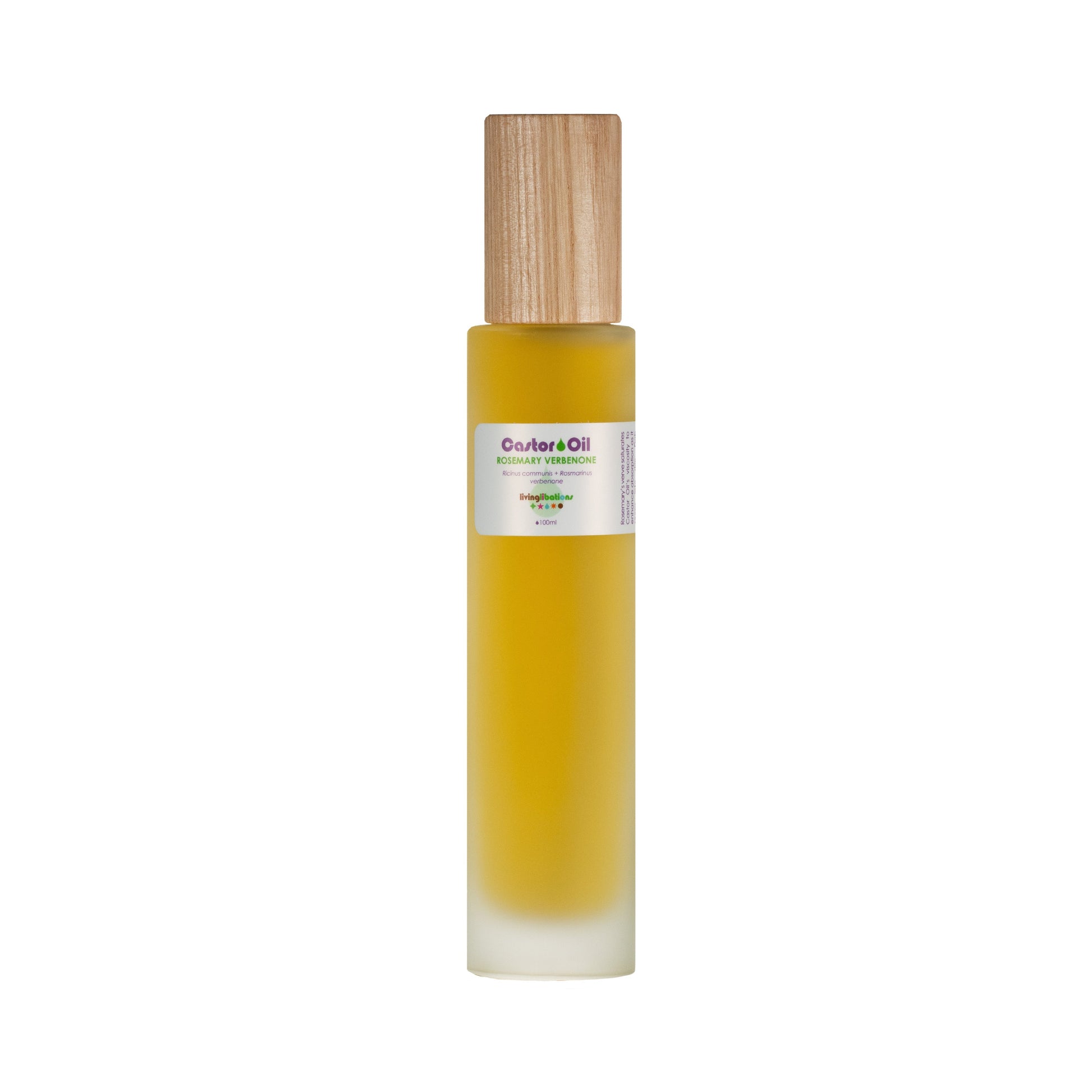 A tall, frosted glass bottle with a light wood cap holds yellow liquid rich in ricinoleic acids. The label says "Castor Oil + Rosemary Verbenone" by Living Libations, ideal for supporting skin conditions, set against a plain white background.