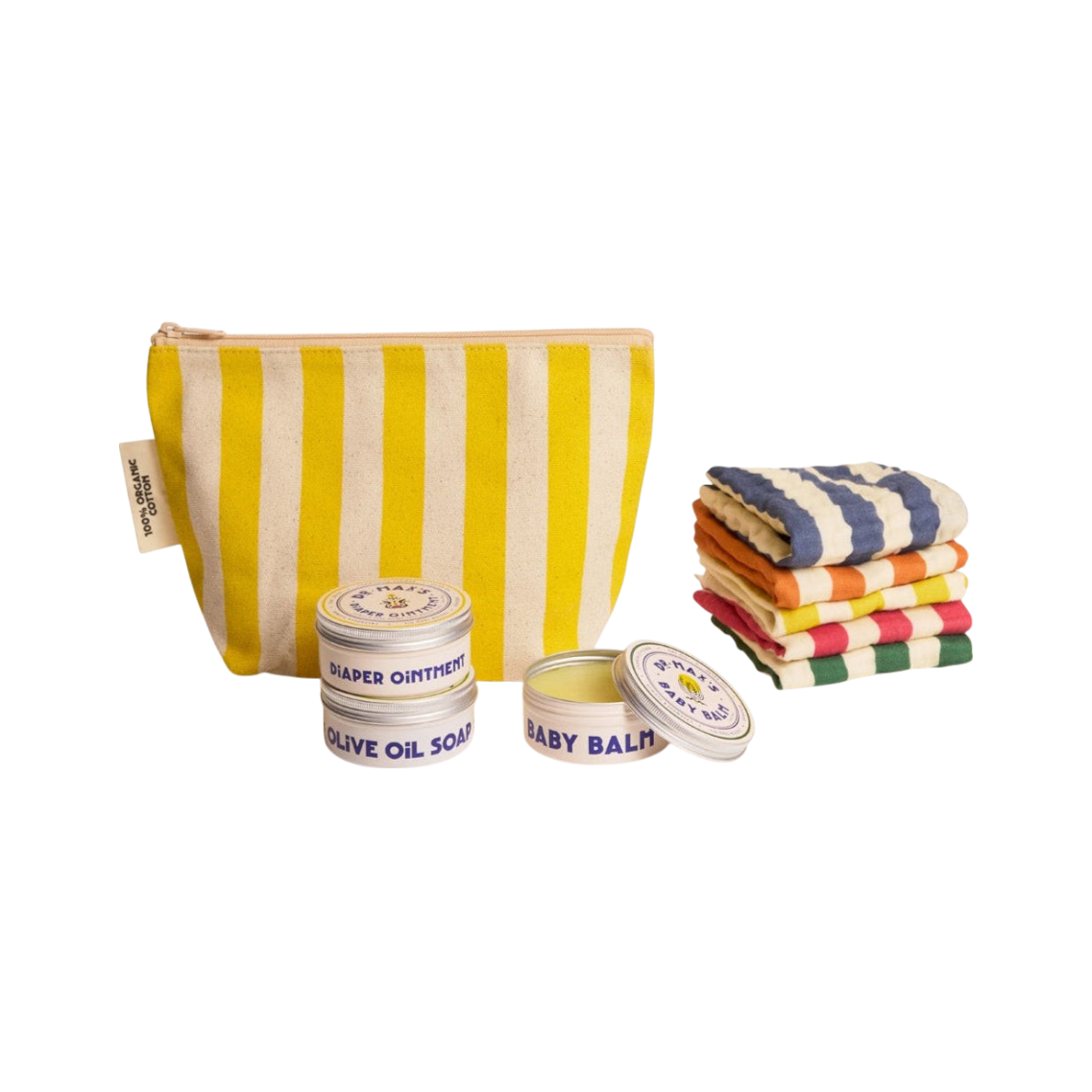 The Dr Maxs Newborn Gift Box includes a yellow and white striped zippered pouch, three labeled organic tins (Diaper Ointment, Olive Oil Soap, Baby Balm), and a stack of colorful striped cloths, all displayed on a simple background.