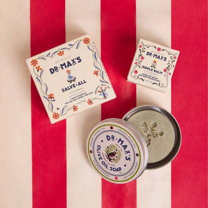 Dr. Max’s Adult Essentials Bundle, displayed on a red and white striped background, features vintage-style floral packaging.