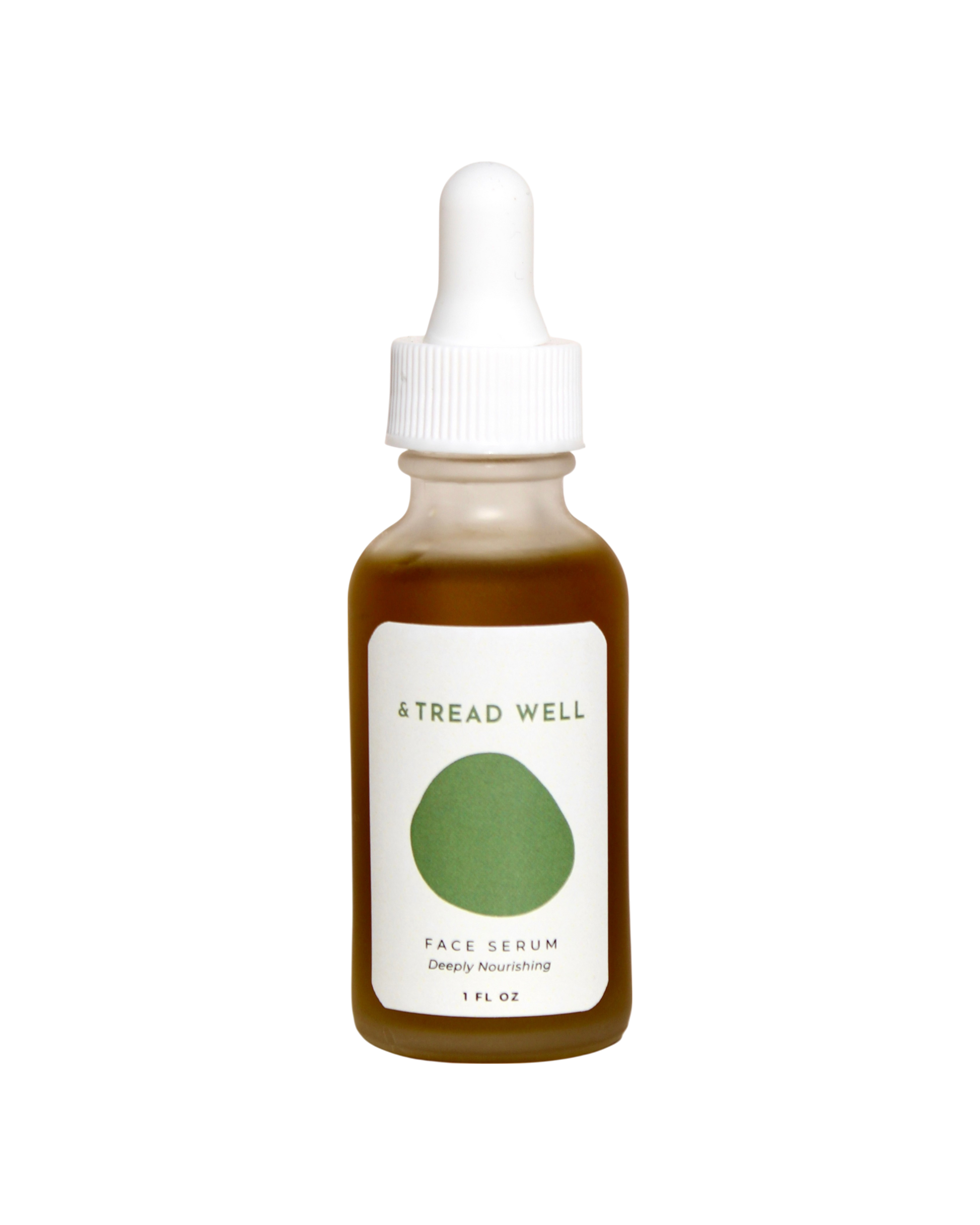 A brown glass dropper bottle labeled "& Tread Well Face Serum" with a green oval design and white cap. This 1 fl oz natural serum is deeply nourishing and hydrating.