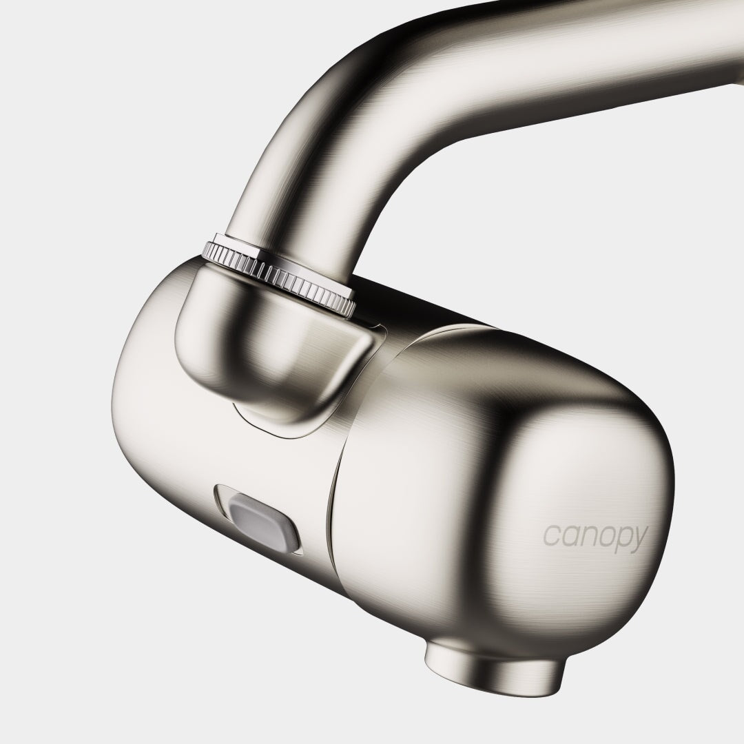 A close-up of the Canopy Faucet Filter shows its smooth, sleek design with a small front button and "Canopy" branding. This product is fulfilled by Canopy for added convenience.