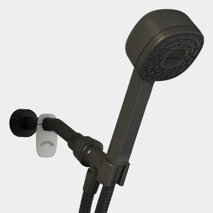 The Canopy Handheld Filtered Showerhead in matte black, featuring a hose and wall-mounted bracket, offers a refreshing bathing experience against a white background.