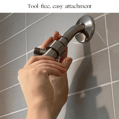 A person easily twists the Canopy Handheld Filtered Showerhead onto a wall-mounted shower arm, showing tool-free installation. Fulfilled by Canopy for fast, reliable shipping.