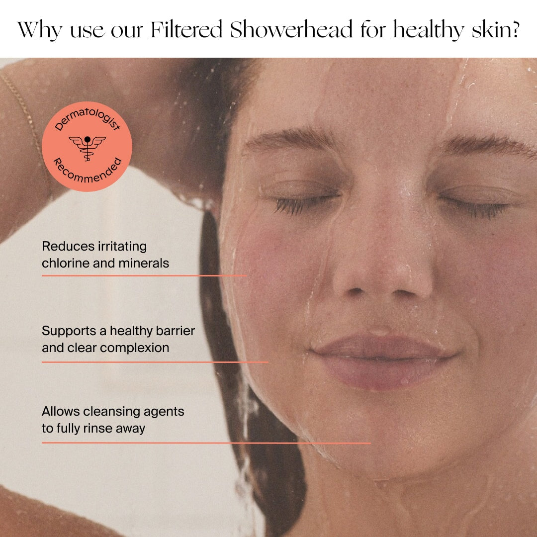 A woman with wet hair and closed eyes enjoys a shower with the Canopy Handheld Filtered Showerhead, which reduces chlorine and minerals, supports the skin barrier, helps rinsing, and is dermatologist recommended. Fulfilled by Canopy.