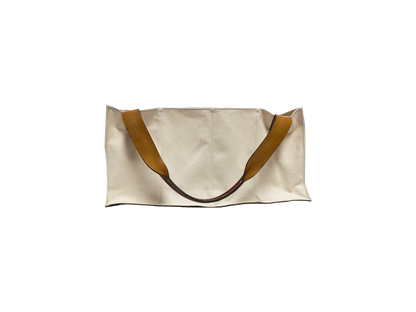 An Agnes Baddoo Market Sac with beige canvas and brown leather handles is pictured against a white background. 