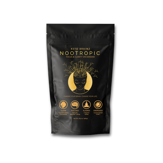 The stylish black, resealable pouch for "Keto Brainz Nootropic Creamer" features elegant gold text alongside a brain graphic with emanating lines. Icons emphasize benefits such as focus and clarity, enhanced by powerful ingredients like Lion's Mane Mushroom and Alpha GPC.