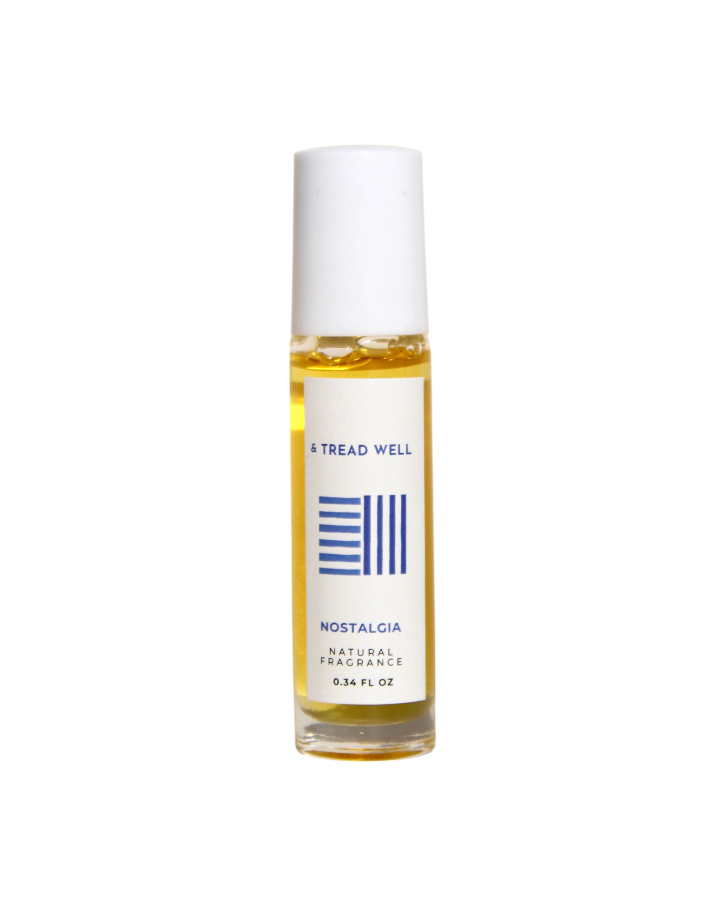 A 0.34 fl oz glass bottle of & Tread Well Natural Fragrance - Nostalgia, with a white cap and minimalist white label featuring blue text and lines.