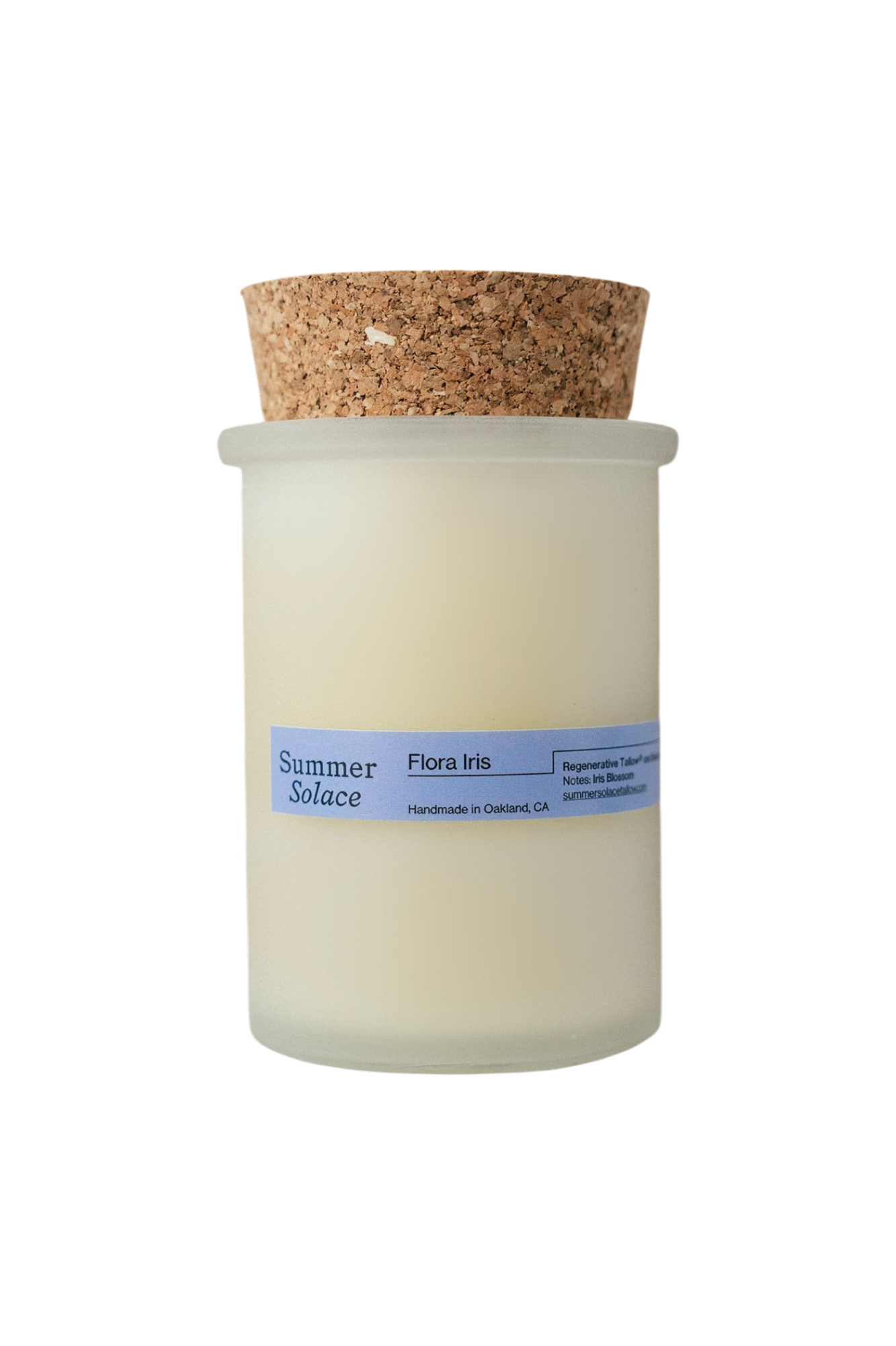 The Flora Iris Candle - Regenerative Tallow® by Summer Solace Tallow is a handmade, pale cream tallow candle in a frosted glass jar with cork lid, featuring a soft iris scent and crafted in Oakland, CA.