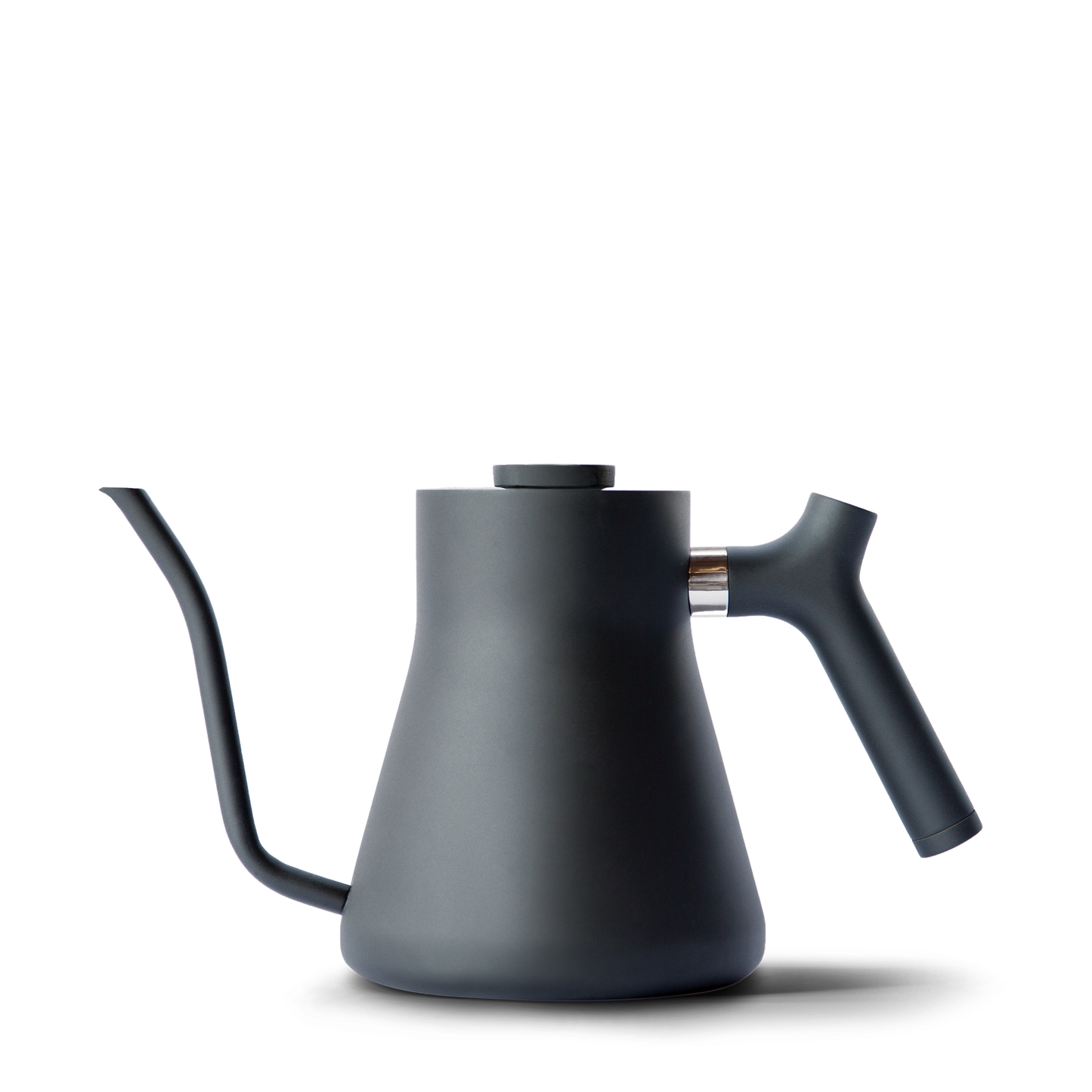 The Stagg Pour-Over Kettle from Fellow Wholesale features a sleek, matte black finish, a precision pour spout, and an ergonomic counterbalanced handle. Its modern, minimalist design ensures perfect control during coffee brewing.