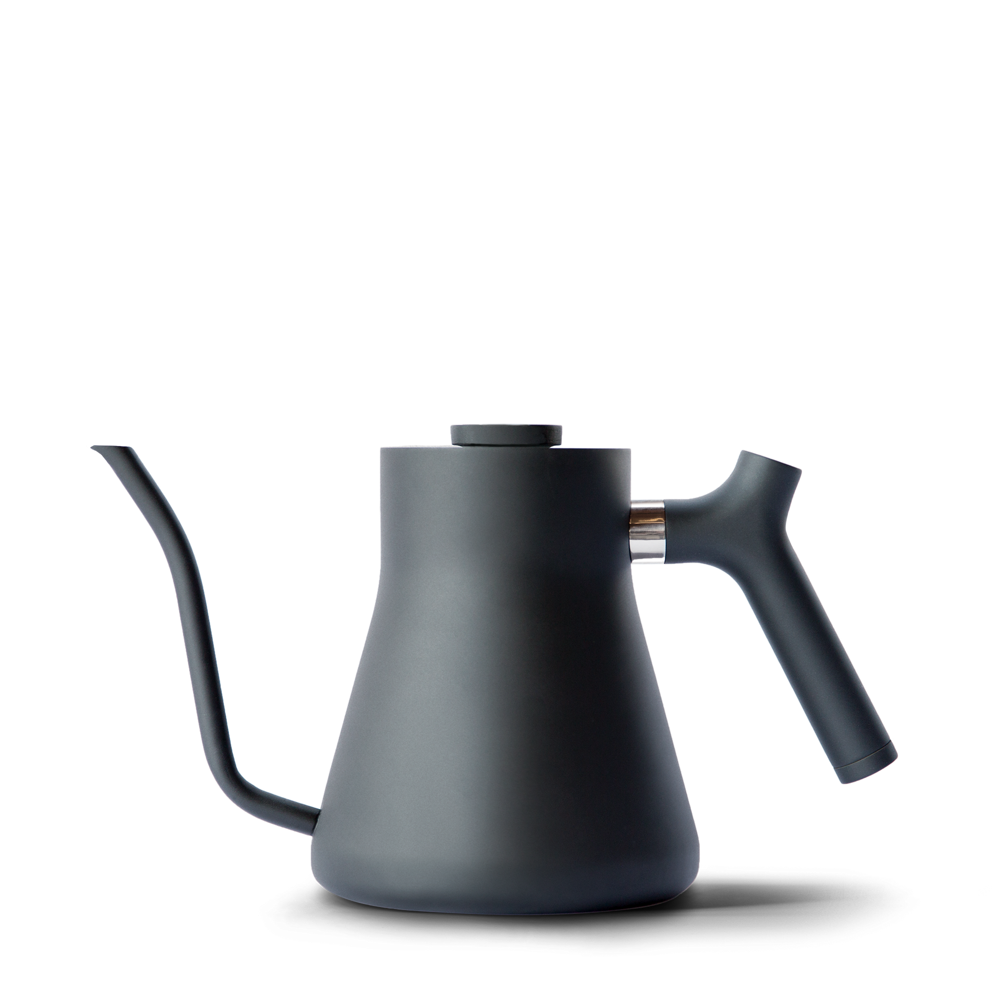 The Stagg Pour-Over Kettle from Fellow Wholesale features a sleek, matte black finish, a precision pour spout, and an ergonomic counterbalanced handle. Its modern, minimalist design ensures perfect control during coffee brewing.