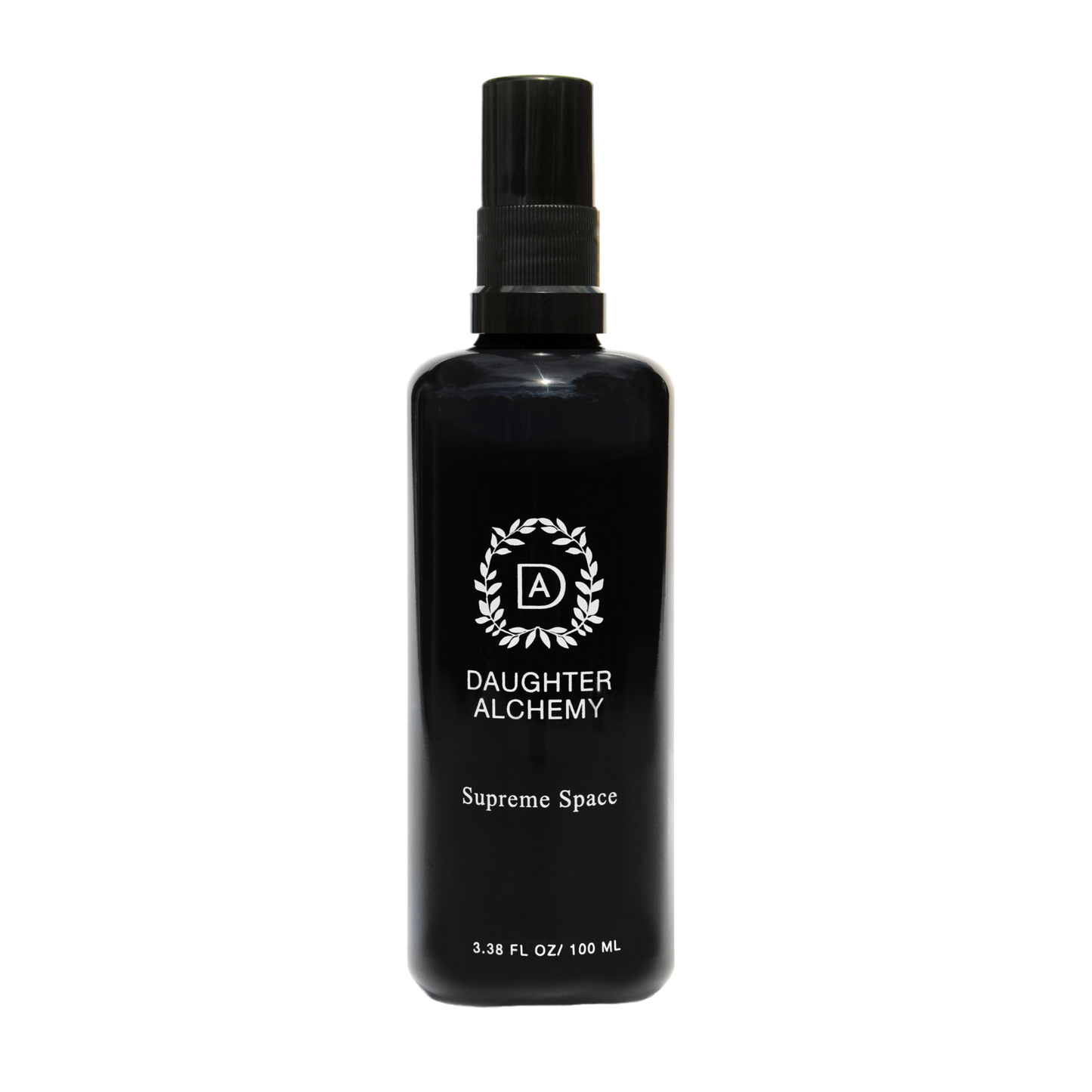 A black spray bottle with a black cap labeled "Daughter Alchemy" and "Supreme Space® Botanical Protective Spray". The bottle also features a circular logo with the letters "DA" in the center. Infused with organic white sage, the volume is listed as 3.38 fl oz / 100 ml.