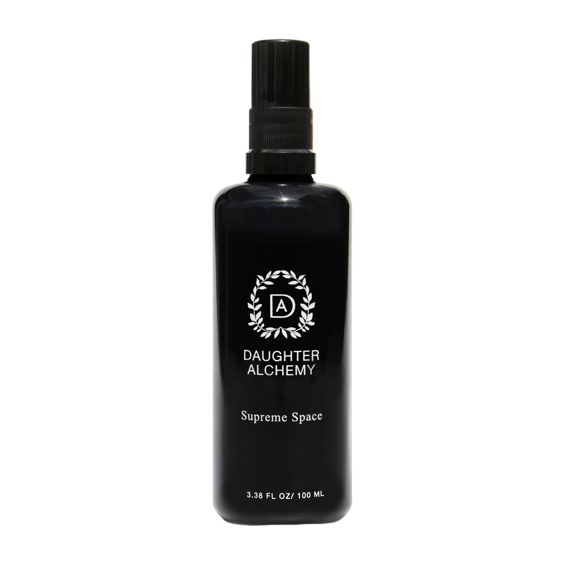A black spray bottle with a black cap labeled "Daughter Alchemy" and "Supreme Space® Botanical Protective Spray". The bottle also features a circular logo with the letters "DA" in the center. Infused with organic white sage, the volume is listed as 3.38 fl oz / 100 ml.
