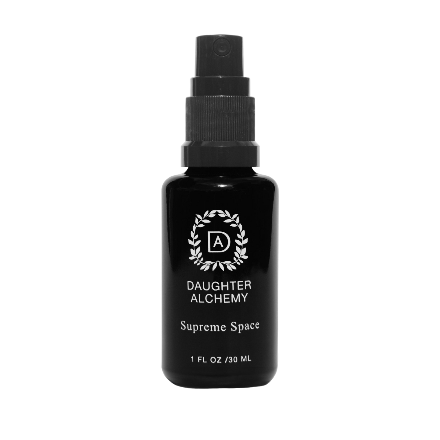 A black spray bottle labeled "Daughter Alchemy" with the text "Supreme Space® Botanical Protective Spray" and "1 FL OZ / 30 ML" near the bottom. The label, adorned with a stylized logo encircled by a wreath design, indicates the inclusion of organic white sage. The bottle has a black cap and a spray nozzle.