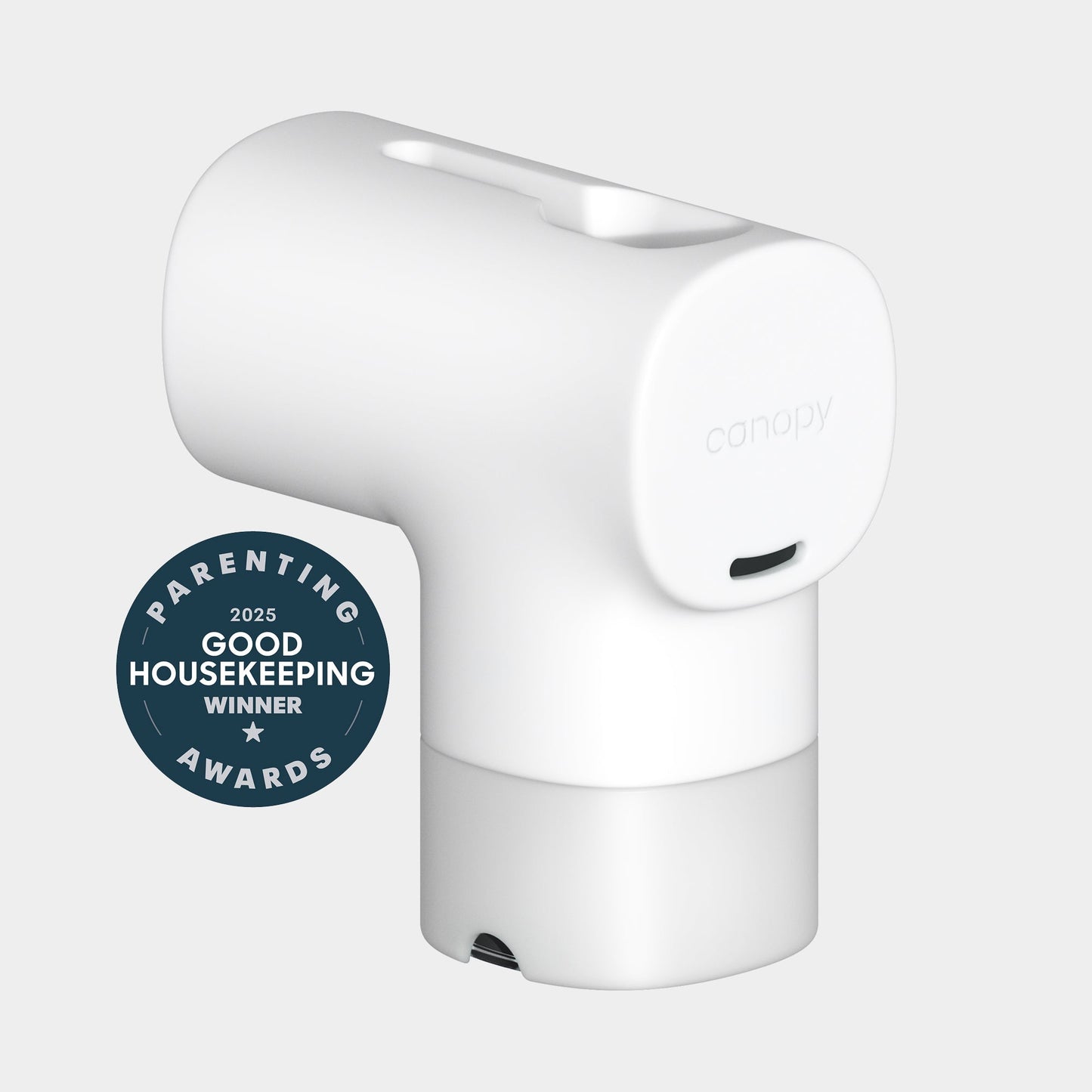 A white, modern Canopy Bath Tub Filter with a rounded, minimalist design sits beside a blue "Parenting Awards 2025 Good Housekeeping Winner" badge. Fulfilled by Canopy.