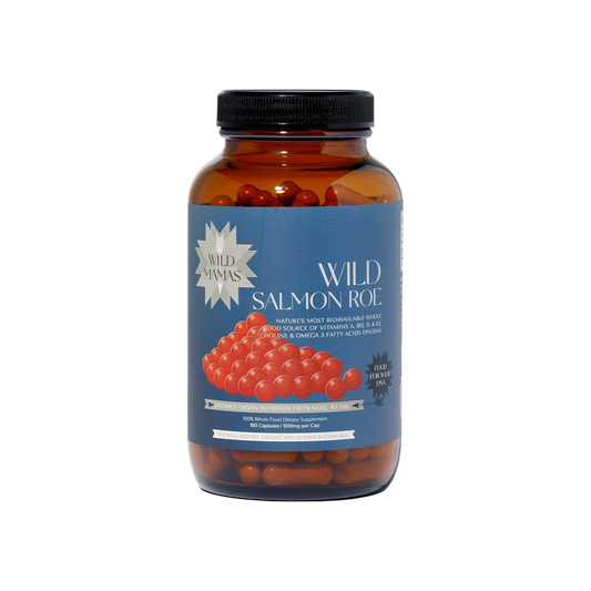 A jar of WildMamas Wild Salmon Roe features bright orange roe on the label with blue and white text, a silver "WildMamas" starburst, and highlights this Omega-3 superfood. It comes topped with a black screw-on lid.