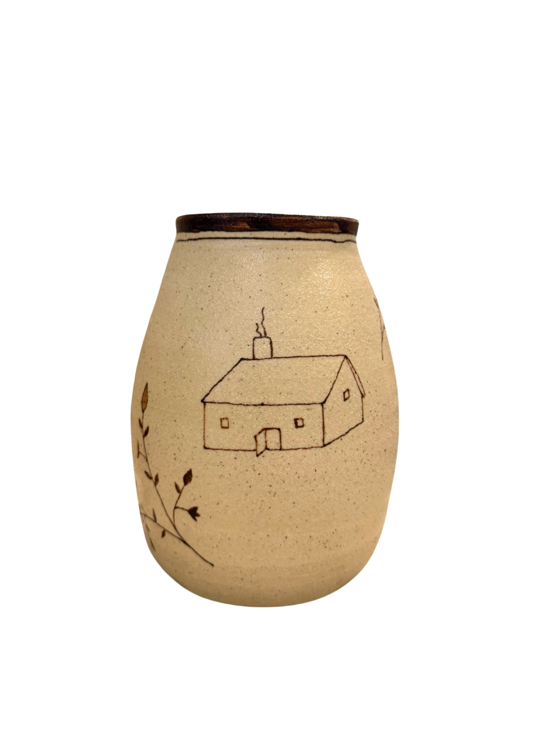 The Baile Homestead Vase by Baile is a cream-colored handmade ceramic vase featuring a simple line drawing of a house, chimney, and leafy branch, displayed against a plain white background.