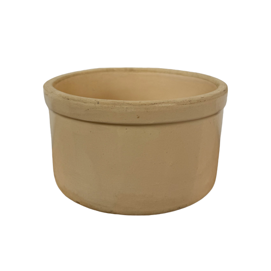 The Vintage Medium Stoneware Crock by Shoppe Maison features a smooth, round shape that is slightly wider at the top than the bottom. Its plain exterior boasts a natural, earthy beige color without any decorative elements, reminiscent of classic vintage homeware. The pot stands out clearly against a completely black background.