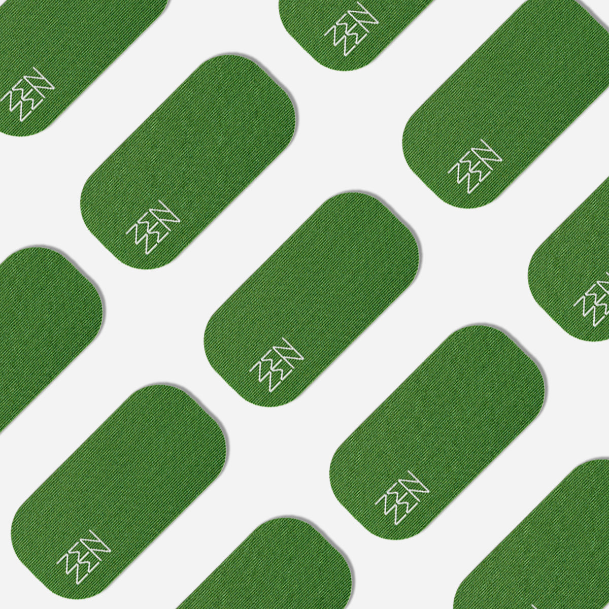 A pattern of green, rounded rectangles with white line drawings on a white background, inspired by the calming support of organic bamboo silk, reflects Zenzentape’s Evergreen Mouthtape.