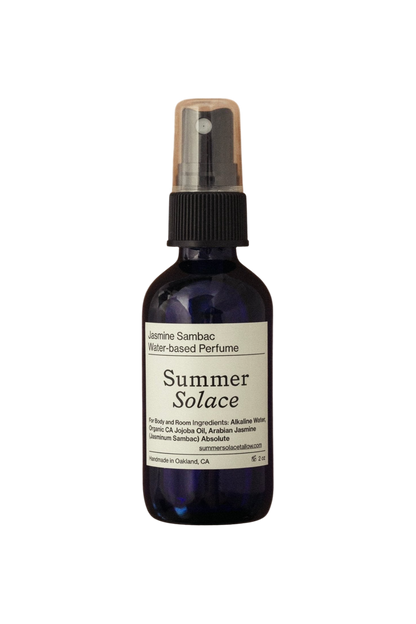 The Summer Solace Tallow Jasmine Sambac + Magnolia Perfume Mist (Water-Based, UPDATED FORMULA) features a white label and clear cap, offering a natural floral scent for body and room use.