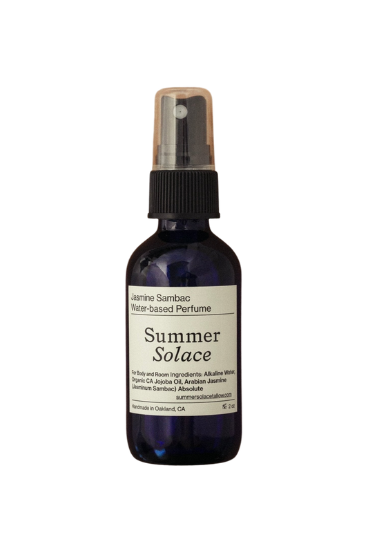 The Summer Solace Tallow Jasmine Sambac + Magnolia Perfume Mist (Water-Based, UPDATED FORMULA) features a white label and clear cap, offering a natural floral scent for body and room use.