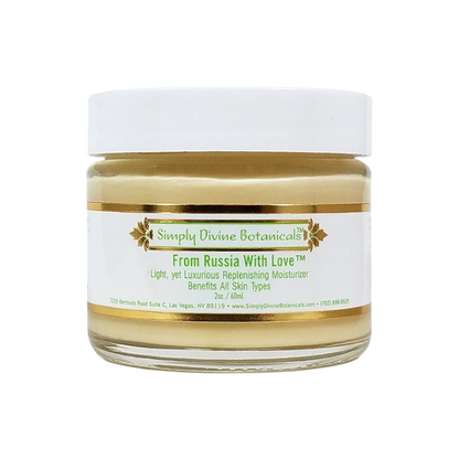 A 2 oz (60 ml) jar of Simply Divine Botanicals From Russia With Love Protective Regenerating Moisturizer with a white lid and gold label, made with vegan ingredients for all skin types.