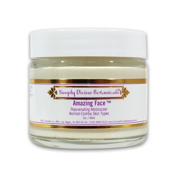 A clear jar with a white lid labeled "Simply Divine Botanicals Amazing Face Rejuvenating Nourishing Moisturizer" sits against a white background, offering a hydrating boost with natural ingredients for normal to combination skin.