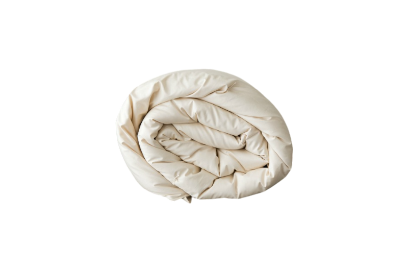 The Ashland Organic Wool Comforter from Shepherd's Dream, neatly rolled up and GOTS-certified, rests against a plain white background, providing thermoregulating warmth and comfort.