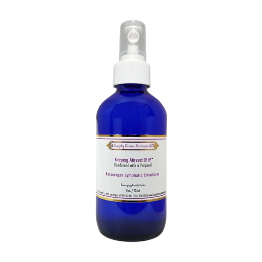 Simply Divine Botanicals' Keeping Abreast Of It Deodorant to Encourage Lymphatic Circulation comes in a blue spray bottle with a white label accented in gold and purple, and features essential oils for natural freshness.