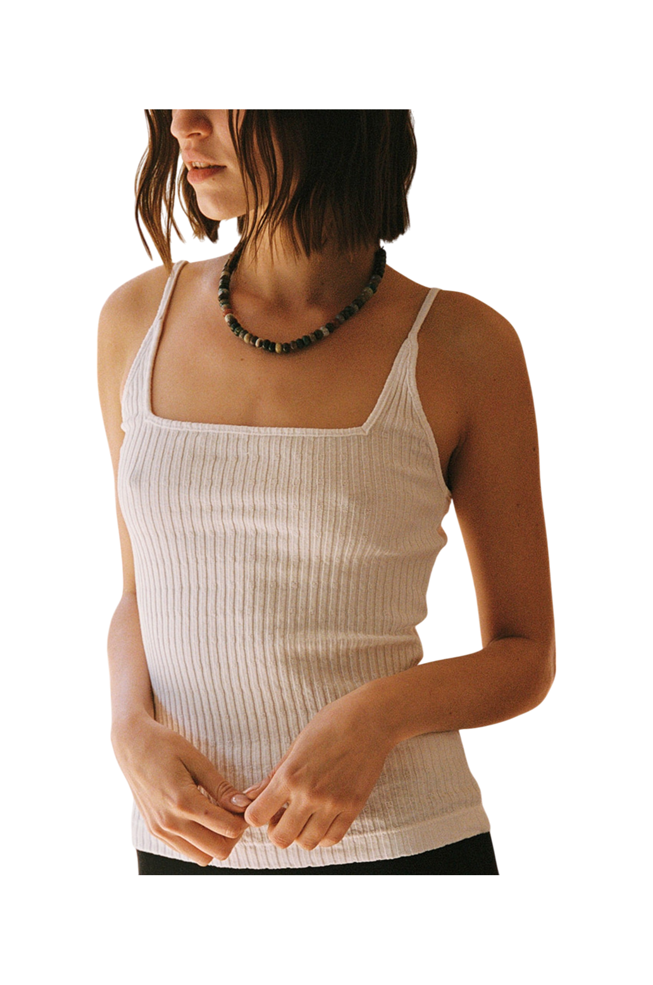 White 
A woman with chin-length brown hair wears the LA Relaxed Pointelle Square Cami and a beaded necklace, standing against a plain background with her hands loosely clasped in front of her.